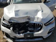 ✅ 2021 BMW X5 xDrive45e • VIN: 5UXTA6C00M9F27743 • Lot: 80132945. Wystawiony na Copart z przebiegiem Nie podano. Bezpłatny archiwum sprzedaży aukcyjnych z USA i szczegółowy raport historii pojazdu na DreamBid. Zdjęcie 11.