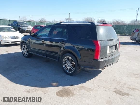 ✅ 2008 Cadillac SRX AWD • VIN: 1GYEE437280128284 • Lot: 41749723. Wystawiony na IAAI z przebiegiem 202 684 mil. Bezpłatny archiwum sprzedaży aukcyjnych z USA i szczegółowy raport historii pojazdu na DreamBid. Zdjęcie 3.