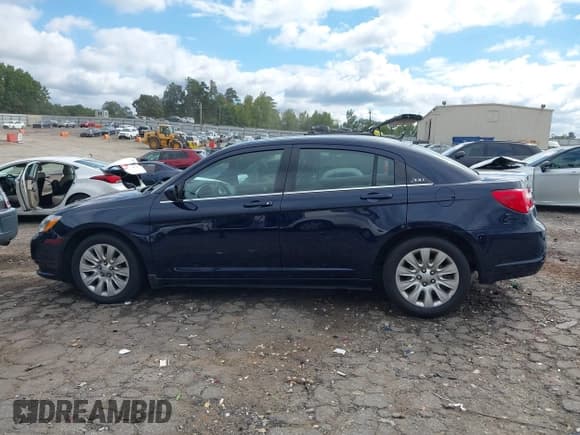 ✅ 2013 Chrysler 200 LX • VIN: 1C3CCBAG1DN726734 • Lot: 43343434. Listed on IAAI with 148,666 mi. Free auction sales archive from the USA and detailed vehicle history report at DreamBid. Image 14.