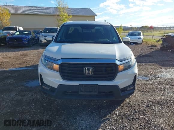 ✅ 2022 Honda Ridgeline RTL • VIN: 5FPYK3F50NB025921 • Lot: 43483259. Listed on IAAI with 45,266 mi. Free auction sales archive from the USA and detailed vehicle history report at DreamBid. Image 12.