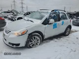 ✅ 2013 Suzuki SX4 Crossover • VIN: JS2YB5A35D6100171 • Лот: 44176215. Опубликован ранее на Copart с пробегом 141 312 миль. Бесплатный доступ к архиву аукционных продаж из США и подробный отчёт об истории автомобиля на DreamBid. Изображение 1.