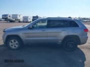 ✅ 2015 Jeep Grand Cherokee Laredo • VIN: 1C4RJFAG3FC103679 • Лот: 43105451. Опубликован ранее на IAAI с пробегом 202 415 миль. Бесплатный доступ к архиву аукционных продаж из США и подробный отчёт об истории автомобиля на DreamBid. Изображение 14.