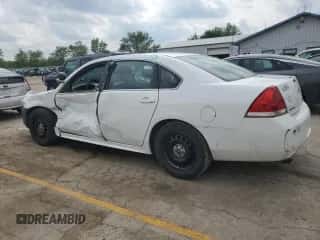 2014 Chevrolet Impala Police Police with VIN 2G1WD5E34E1126347, listed as a Copart auction lot 58949635 with 239,628 mi miles and Salvage title. Bid and sale history available at DreamBid. Image 2.