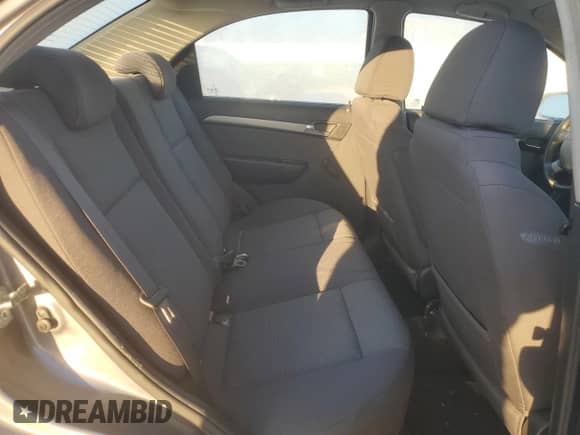 2009 Chevrolet Aveo 1LT z VIN KL1TD56E39B608752, wystawiony jako Copart lot #43245865 z przebiegiem 140 707 mil mil oraz Szkoda całkowita • Salvage title. Historia ofert i sprzedaży dostępna na DreamBid. Obrazek 11.