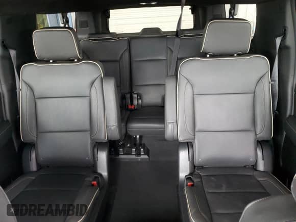 2023 Chevrolet Suburban Premier with VIN 1GNSKFKD2PR541490, listed as a Copart auction lot 58934005 with 25,796 mi miles and Salvage title. Bid and sale history available at DreamBid. Image 10.