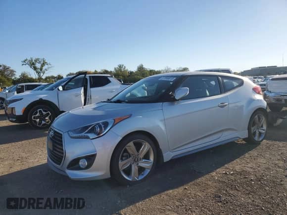 ✅ 2014 Hyundai Veloster Turbo • VIN: KMHTC6AE6EU184759 • Lot: 87099815. Wystawiony na Copart z przebiegiem 37 274 mil. Bezpłatny archiwum sprzedaży aukcyjnych z USA i szczegółowy raport historii pojazdu na DreamBid. Zdjęcie 1.