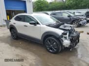 ✅ 2023 Mazda CX-30 Premium • VIN: 3MVDMBDY8PM561294 • Lot: 63564815. Listed on Copart with 7,110 mi. Free auction sales archive from the USA and detailed vehicle history report at DreamBid. Image 4.