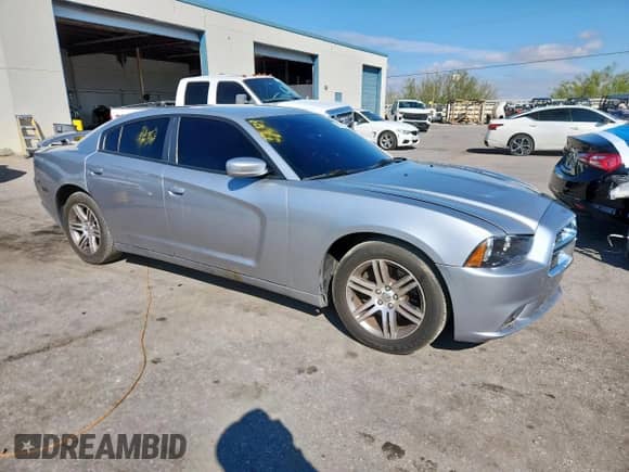 ✅ 2013 Dodge Charger Police • VIN: 2C3CDXAT1DH660296 • Lot: 85577805. Listed on Copart with 153,591 mi. Free auction sales archive from the USA and detailed vehicle history report at DreamBid. Image 4.