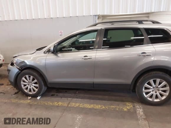✅ 2010 Mazda CX-9 Grand Touring • VIN: JM3TB3MV4A0211564 • Лот: 41754078. Опубликован ранее на IAAI с пробегом 163 040 миль. Бесплатный доступ к архиву аукционных продаж из США и подробный отчёт об истории автомобиля на DreamBid. Изображение 14.