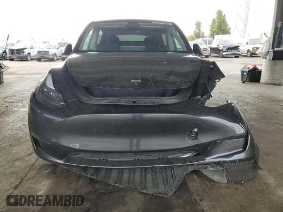 ✅ 2025 Tesla Model Y Long Range • VIN: 7SAYGDED0SF267132 • Lot: 84027995. Listed on Copart with 14,878 mi. Free auction sales archive from the USA and detailed vehicle history report at DreamBid. Image 5.