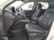 ✅ 2021 Mazda CX-5 Touring • VIN: JM3KFBCM3M0452068 • Lot: 82182915. Wystawiony na Copart z przebiegiem 24 079 mil. Bezpłatny archiwum sprzedaży aukcyjnych z USA i szczegółowy raport historii pojazdu na DreamBid. Zdjęcie 7.