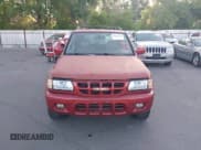 ✅ 2001 Isuzu Rodeo S • VIN: 4S2CK58W414308980 • Lot: 42496432. Listed on IAAI with 166,360 mi. Free auction sales archive from the USA and detailed vehicle history report at DreamBid. Image 6.