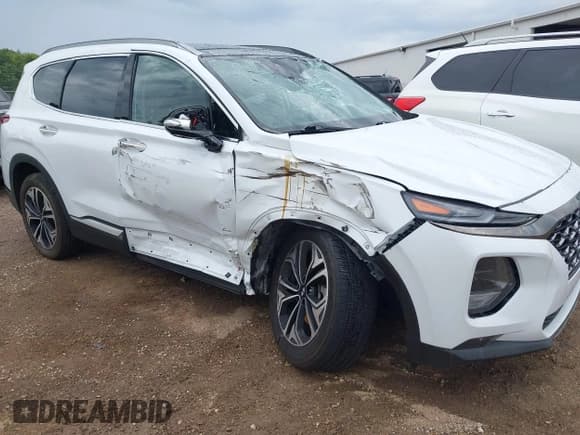 ✅ 2020 Hyundai Santa Fe Limited • VIN: 5NMS5CAA7LH182626 • Лот: 42678485. Опубликован ранее на IAAI с пробегом 71 573 миль. Бесплатный доступ к архиву аукционных продаж из США и подробный отчёт об истории автомобиля на DreamBid. Изображение 6.