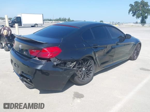 ✅ 2014 BMW M6 • VIN: WBS6C9C52EDV73651 • Lot: 42110470. Listed on IAAI with 127,576 mi. Free auction sales archive from the USA and detailed vehicle history report at DreamBid. Image 4.