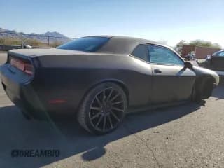 ✅ 2014 Dodge Challenger SXT 100th Anniversary • VIN: 2C3CDYAG5EH233925 • Lot: 75913884. Wystawiony na Copart z przebiegiem 102 791 mil. Bezpłatny archiwum sprzedaży aukcyjnych z USA i szczegółowy raport historii pojazdu na DreamBid. Zdjęcie 3.