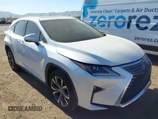 ✅ 2019 Lexus RX 450h • VIN: 2T2BGMCA2KC029861 • Lot: 43564217. Listed on IAAI with 30,844 mi. Free auction sales archive from the USA and detailed vehicle history report at DreamBid. Image 1.