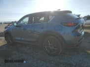 ✅ 2021 Mazda CX-5 Touring • VIN: JM3KFACMXM0445631 • Lot: 82556965. Wystawiony na Copart z przebiegiem 39 563 mil. Bezpłatny archiwum sprzedaży aukcyjnych z USA i szczegółowy raport historii pojazdu na DreamBid. Zdjęcie 2.