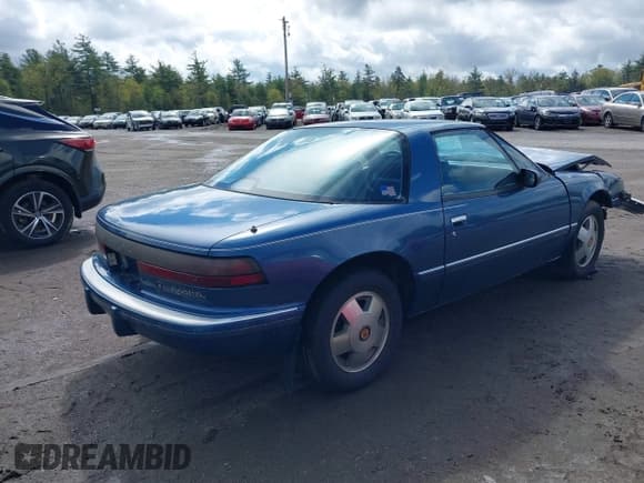 ✅ 1988 Buick Reatta • VIN: 1G4EC11C4JB903281 • Lot: 42205736. Listed on IAAI with 83,710 mi. Free auction sales archive from the USA and detailed vehicle history report at DreamBid. Image 4.
