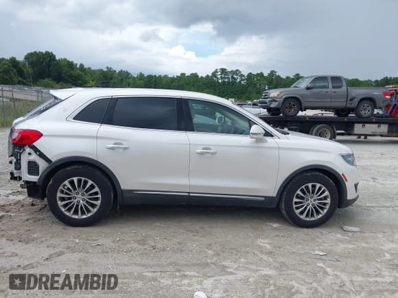 ✅ 2017 Lincoln MKX Select • VIN: 2LMPJ6KP4HBL18254 • Лот: 42771053. Опубликован ранее на IAAI с пробегом 63 994 миль. Бесплатный доступ к архиву аукционных продаж из США и подробный отчёт об истории автомобиля на DreamBid. Изображение 14.