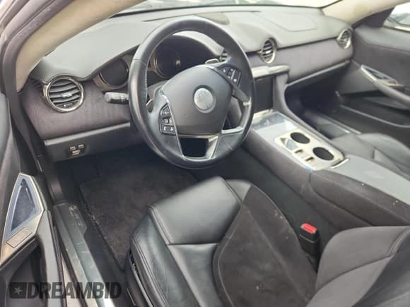 ✅ 2012 Fisker Karma EcoSport • VIN: YH4K14AA5CA000620 • Lot: 62481715. Wystawiony na Copart z przebiegiem Nie podano. Bezpłatny archiwum sprzedaży aukcyjnych z USA i szczegółowy raport historii pojazdu na DreamBid. Zdjęcie 8.