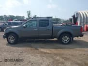 ✅ 2009 Nissan Frontier SE • VIN: 1N6AD09W19C407379 • Lot: 42494543. Listed on IAAI with 209,680 mi. Free auction sales archive from the USA and detailed vehicle history report at DreamBid. Image 14.