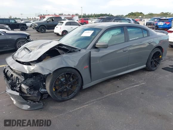 ✅ 2019 Dodge Charger Scat Pack • VIN: 2C3CDXGJ8KH710341 • Лот: 43608067. Опубликован ранее на IAAI с пробегом 103 314 миль. Бесплатный доступ к архиву аукционных продаж из США и подробный отчёт об истории автомобиля на DreamBid. Изображение 18.