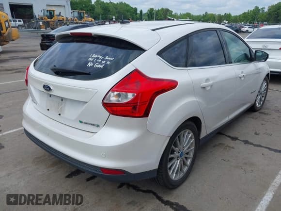 ✅ 2013 Ford Focus Electric • VIN: 1FADP3R46DL133781 • Lot: 42129143. Listed on IAAI with 114,041 mi. Free auction sales archive from the USA and detailed vehicle history report at DreamBid. Image 4.