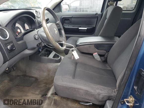 ✅ 2006 Mitsubishi Raider LS • VIN: 1Z7HC22K86S578515 • Lot: 68068945. Wystawiony na Copart z przebiegiem 143 076 mil. Bezpłatny archiwum sprzedaży aukcyjnych z USA i szczegółowy raport historii pojazdu na DreamBid. Zdjęcie 7.