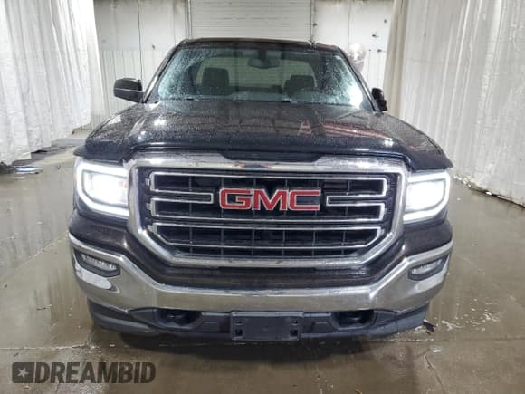 ✅ 2018 GMC Sierra 1500 SLE • VIN: 1GTV2MECXJZ243208 • Лот: 83945865. Опубликован ранее на Copart с пробегом 62 455 миль. Бесплатный доступ к архиву аукционных продаж из США и подробный отчёт об истории автомобиля на DreamBid. Изображение 5.