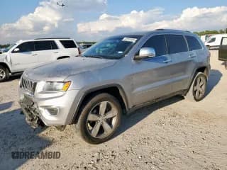 ✅ 2015 Jeep Grand Cherokee Limited • VIN: 1C4RJEBG6FC707400 • Лот: 82242465. Опубликован ранее на Copart с пробегом 212 531 миль. Бесплатный доступ к архиву аукционных продаж из США и подробный отчёт об истории автомобиля на DreamBid. Изображение 1.