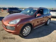 ✅ 2012 Porsche Cayenne S Hybrid • VIN: WP1AE2A28CLA92137 • Лот: 82252775. Опубликован ранее на Copart с пробегом 195 968 миль. Бесплатный доступ к архиву аукционных продаж из США и подробный отчёт об истории автомобиля на DreamBid. Изображение 1.