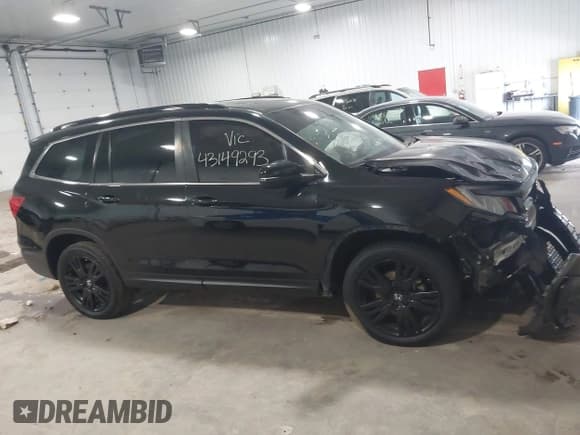 ✅ 2021 Honda Pilot Special Edition • VIN: 5FNYF6H24MB057223 • Lot: 43149293. Wystawiony na IAAI z przebiegiem 149 579 mil. Bezpłatny archiwum sprzedaży aukcyjnych z USA i szczegółowy raport historii pojazdu na DreamBid. Zdjęcie 13.