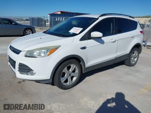 ✅ 2015 Ford Escape SE • VIN: 1FMCU0GX2FUC34335 • Lot: 43554941. Listed on IAAI with 226,483 mi. Free auction sales archive from the USA and detailed vehicle history report at DreamBid. Image 2.