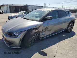 ✅ 2023 Kia EV6 Wind • VIN: KNDC3DLC7P5124412 • Лот: 66167044. Опубликован ранее на Copart с пробегом 4 305 миль. Бесплатный доступ к архиву аукционных продаж из США и подробный отчёт об истории автомобиля на DreamBid. Изображение 1.