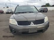✅ 2011 Mitsubishi Endeavor LS • VIN: 4A4JM2AS1BE023886 • Lot: 86185465. Listed on Copart with 217,231 mi. Free auction sales archive from the USA and detailed vehicle history report at DreamBid. Image 5.