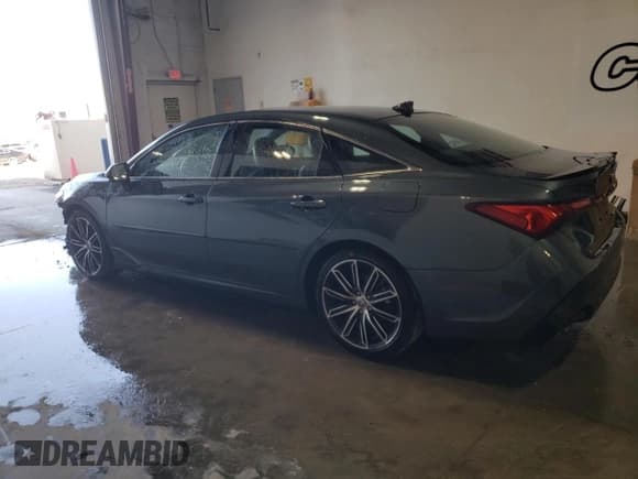 ✅ 2022 Toyota Avalon Touring • VIN: 4T1HZ1FBXNU086100 • Lot: 77316044. Listed on Copart with 56,469 mi. Free auction sales archive from the USA and detailed vehicle history report at DreamBid. Image 2.