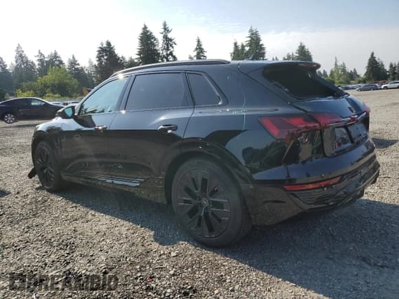 ✅ 2024 Audi Q8 e-tron Prestige • VIN: WA16ABGE9RB017654 • Lot: 61954885. Listed on Copart with 5,041 mi. Free auction sales archive from the USA and detailed vehicle history report at DreamBid. Image 2.