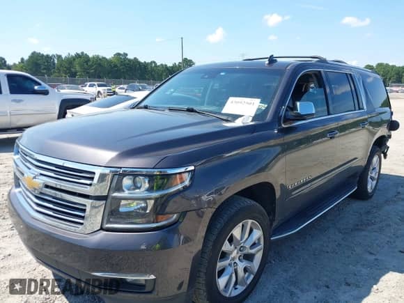 2017 Chevrolet Suburban Premier with VIN 1GNSKJKC1HR403063, listed as a IAAI auction lot 43092501 with 163,931 mi miles and . Bid and sale history available at DreamBid. Image 2.