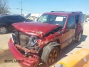 ✅ 2012 Jeep Liberty Sport • VIN: 1C4PJMAK5CW113964 • Lot: 43426100. Listed on IAAI with 128,599 mi. Free auction sales archive from the USA and detailed vehicle history report at DreamBid. Image 2.