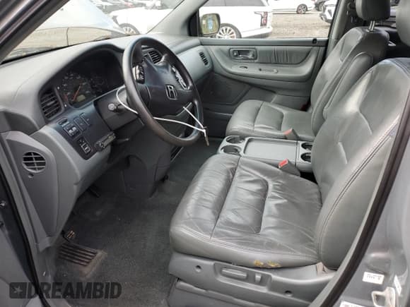 ✅ 2002 Honda Odyssey EX-L • VIN: 2HKRL18092H511642 • Lot: 84623755. Listed on Copart with 242,050 mi. Free auction sales archive from the USA and detailed vehicle history report at DreamBid. Image 7.