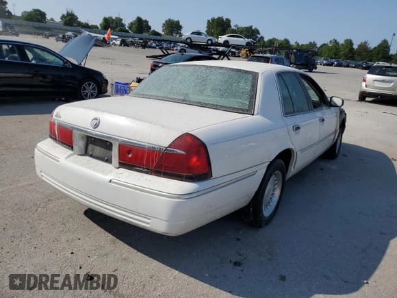 ✅ 1999 Mercury Grand Marquis LS • VIN: 2MEFM75W1XX736301 • Лот: 69645975. Опубликован ранее на Copart с пробегом Не указан. Бесплатный доступ к архиву аукционных продаж из США и подробный отчёт об истории автомобиля на DreamBid. Изображение 3.