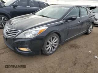 2013 Hyundai Azera z VIN KMHFH4JG6DA233074, wystawiony jako Copart lot #87653725 z przebiegiem 150 481 mil mil oraz Szkoda całkowita • Salvage title. Historia ofert i sprzedaży dostępna na DreamBid. Obrazek 1.