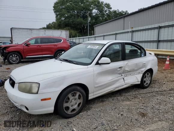 2002 Hyundai Elantra GLS with VIN KMHDN45D82U245688, listed as a Copart auction lot 72620044 with 156,266 mi miles and Salvage title. Bid and sale history available at DreamBid. Image 1.