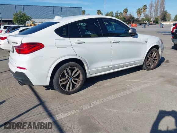 ✅ 2017 BMW X4 M40i • VIN: 5UXXW7C59H0U25191 • Lot: 41867852. Listed on IAAI with 76,301 mi. Free auction sales archive from the USA and detailed vehicle history report at DreamBid. Image 4.