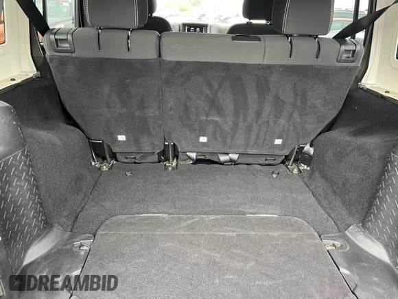 ✅ 2015 Jeep Wrangler Unlimited Sahara • VIN: 1C4BJWEG2FL770349 • Лот: 43791994. Опубликован ранее на IAAI с пробегом 65 839 миль. Бесплатный доступ к архиву аукционных продаж из США и подробный отчёт об истории автомобиля на DreamBid. Изображение 10.