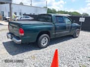 ✅ 2000 Dodge Dakota Sport • VIN: 1B7GL2AX1YS634818 • Lot: 42859891. Listed on IAAI with 132,734 mi. Free auction sales archive from the USA and detailed vehicle history report at DreamBid. Image 4.