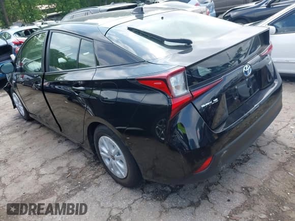 ✅ 2022 Toyota Prius L Eco • VIN: JTDKAMFU8N3181135 • Lot: 42098611. Listed on IAAI with 69,949 mi. Free auction sales archive from the USA and detailed vehicle history report at DreamBid. Image 3.