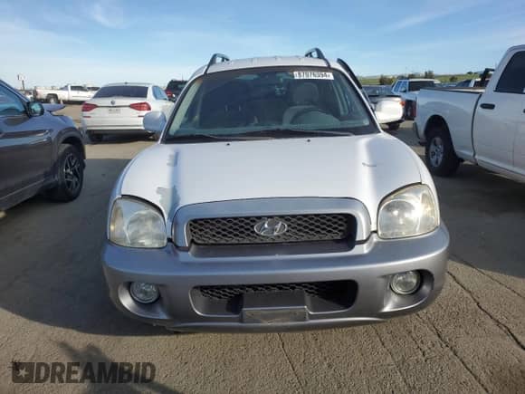 2004 Hyundai Santa Fe GLS z VIN KM8SC13E64U668201, wystawiony jako Copart lot #87076394 z przebiegiem 107 853 mil mil oraz Szkoda całkowita • Salvage title. Historia ofert i sprzedaży dostępna na DreamBid. Obrazek 5.