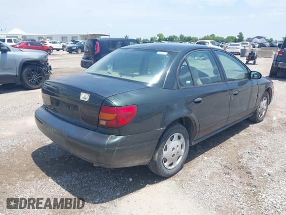 ✅ 2000 Saturn SL • VIN: 1G8ZH5280YZ180615 • Lot: 42491523. Wystawiony na IAAI z przebiegiem 157 550 mil. Bezpłatny archiwum sprzedaży aukcyjnych z USA i szczegółowy raport historii pojazdu na DreamBid. Zdjęcie 4.