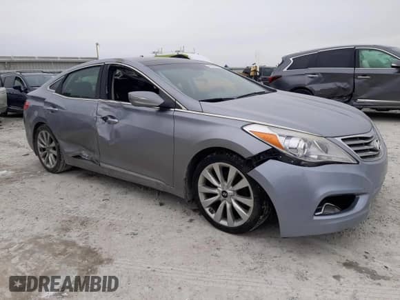 2014 Hyundai Azera Limited с VIN KMHFH4JGXEA396361, выставлен на аукционе Copart как лот 41902995 с пробегом 249 609 миль миль и Списание • Salvage title. История ставок и продаж доступна на DreamBid. Изображение 4.